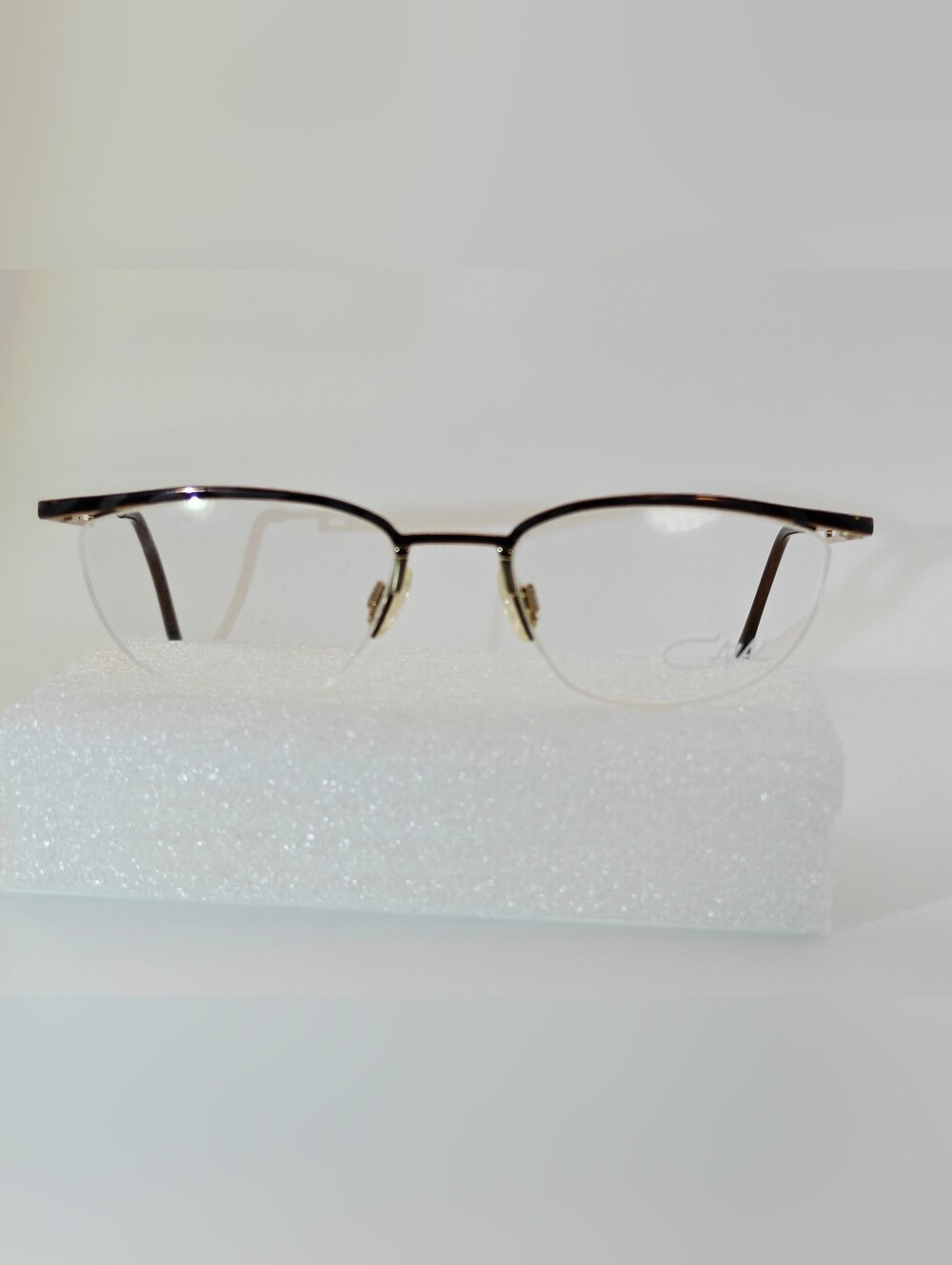 Cazal Model 425. Col969. 51-18. 135. Gold Black blue. Semi Rimless. Spring Hinge